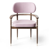 Elegant upholstered chair with wooden frame and gold accents, perfect for modern interiors. Maison Mermont.