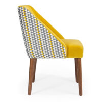 Stylish chair featuring a yellow velvet seat and a geometric patterned backrest, perfect for modern decor. Maison Mermont.