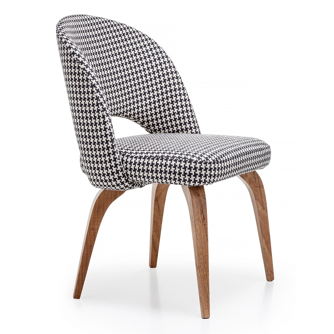 Stylish upholstered chair with a modern houndstooth pattern and wooden legs, perfect for contemporary interiors. Maison Mermont.