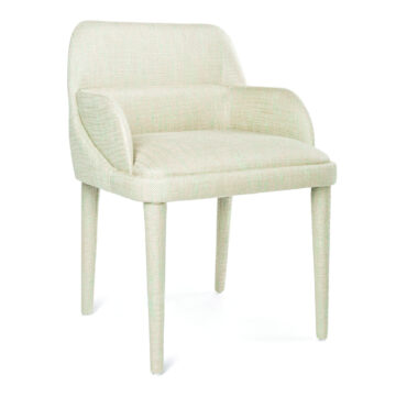 Elegant light green upholstered chair with curved arms and wooden legs, perfect for modern interiors. Maison Mermont.