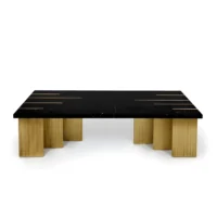 Maison Mermont - Pianist Coffee Table - Nero Marquina Marble - Oxidized Brushed Brass Elegant marble coffee table with gold accents and a modern design, perfect for stylish living spaces. Maison Mermont.