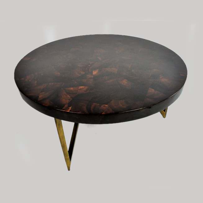 Two round nesting coffee tables with metal legs, featuring shagreen and shell tabletops. Maison Mermont